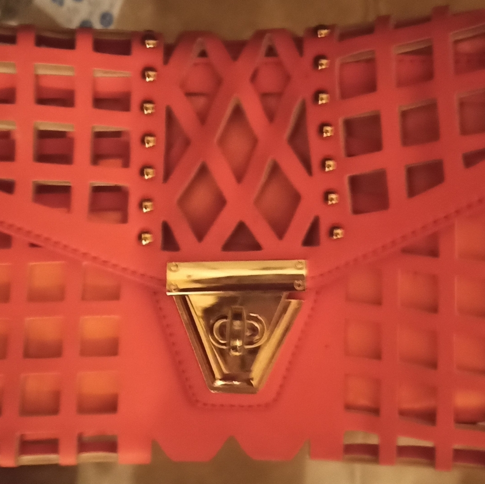 Laser cut envelope clutch